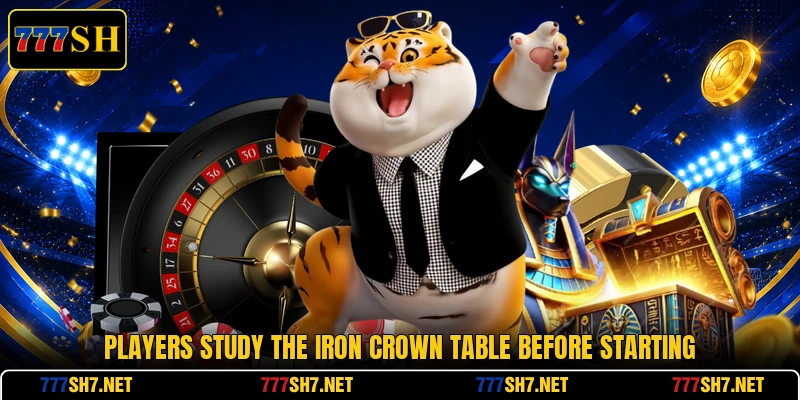 Players study the Iron Crown table before starting Players study the Iron Crown table before starting